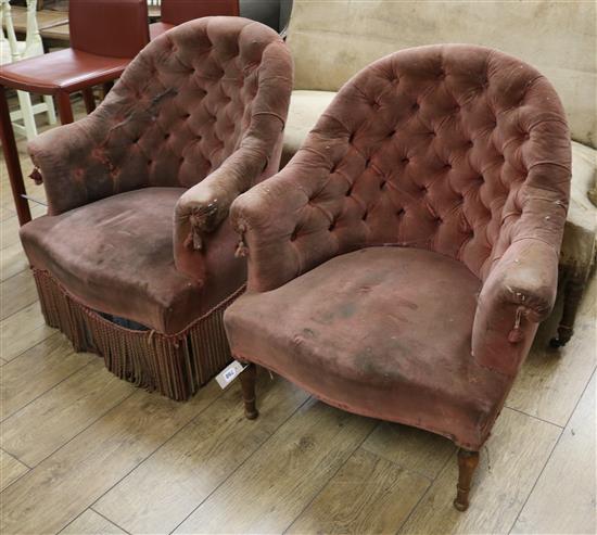 A pair of Victorian buttoned tub chairs